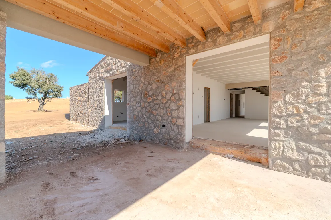 Finca Vitalia – Arquitectura artesanal de piedra natural con carácter-9