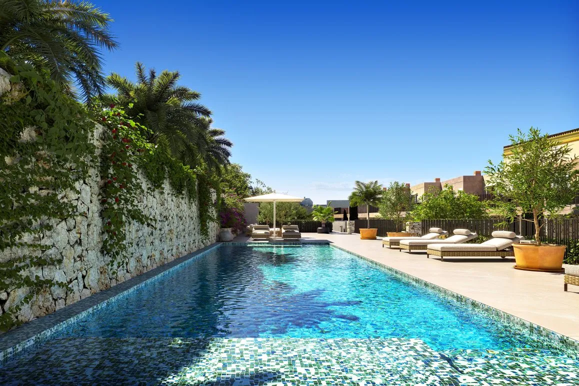 Maison mitoyenne neuve élégante avec jardin et piscine commune à Artà-2