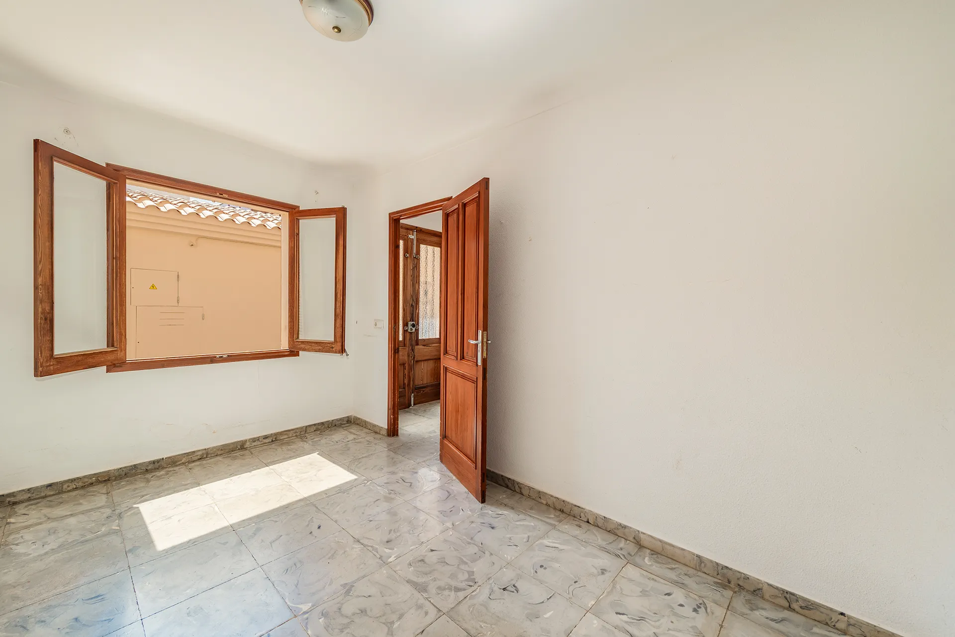 Opportunità di ristrutturazione a Pollença: tanto spazio per la vostra casa dei sogni-10