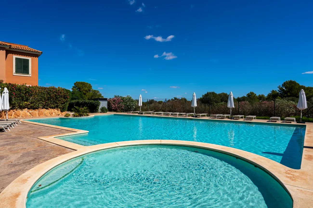 Appartamento al piano terra con giardino privato in un esclusivo complesso residenziale-2