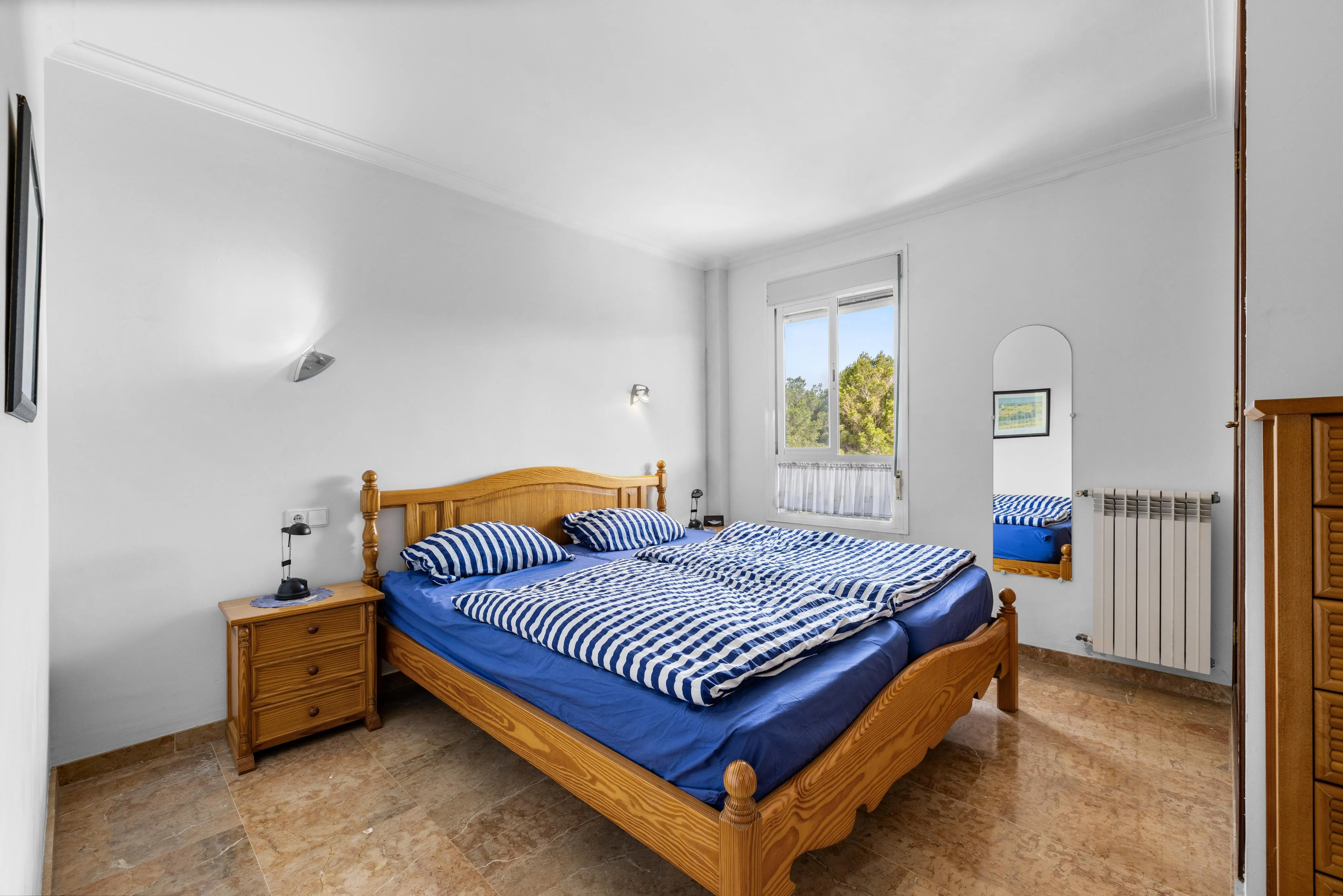 Light-filled apartment with pool, balcony and views-4