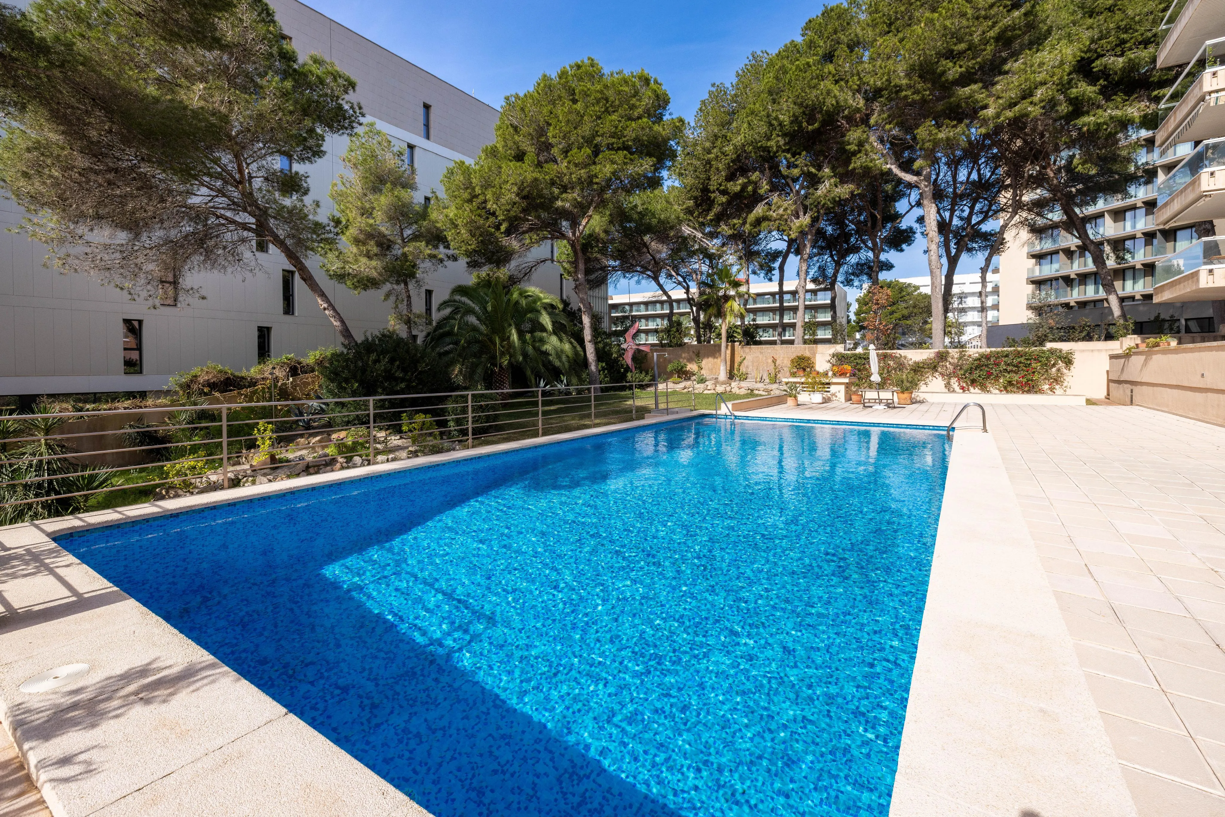 Light-filled apartment with pool, balcony and views-3