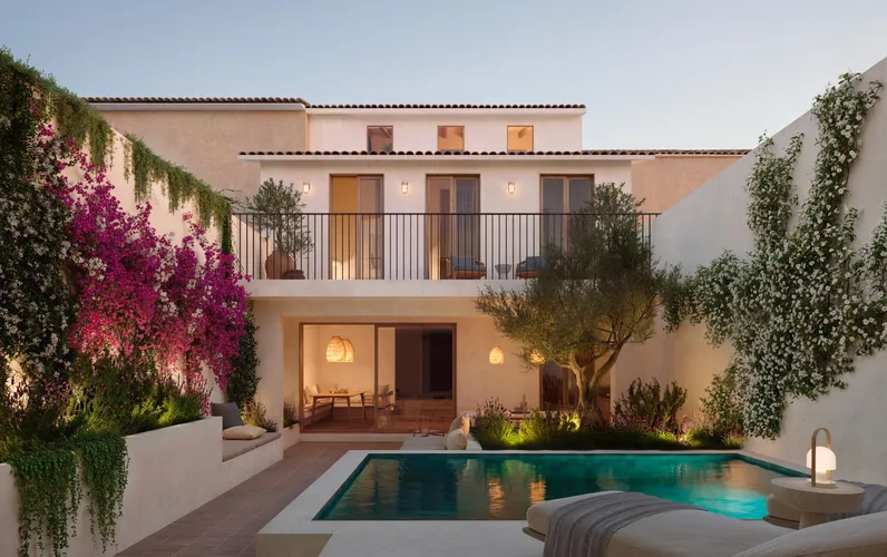 Casa adosada de diseño exclusivo con patio, piscina y licencia de obra en el corazón de Pollença