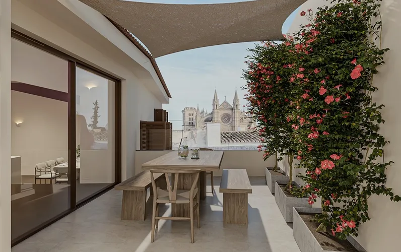 Charming penthouse with private terrace and cathedral views in historic building