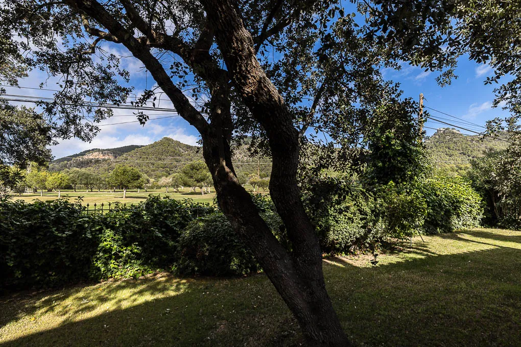 Elegante villa frente al campo de golf-16