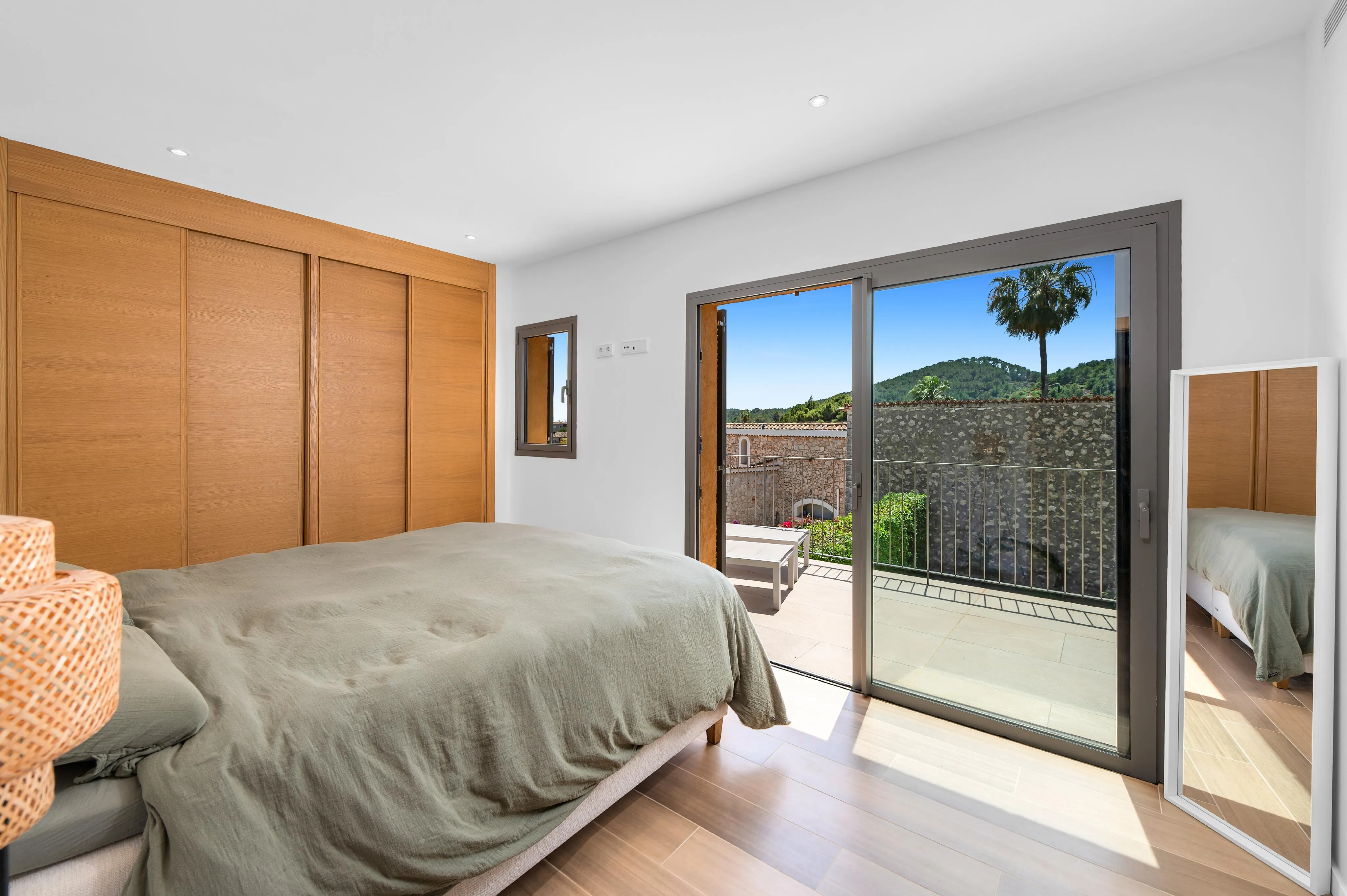 Modern end-of-terrace house with pool and garden in Es Capdellà-10