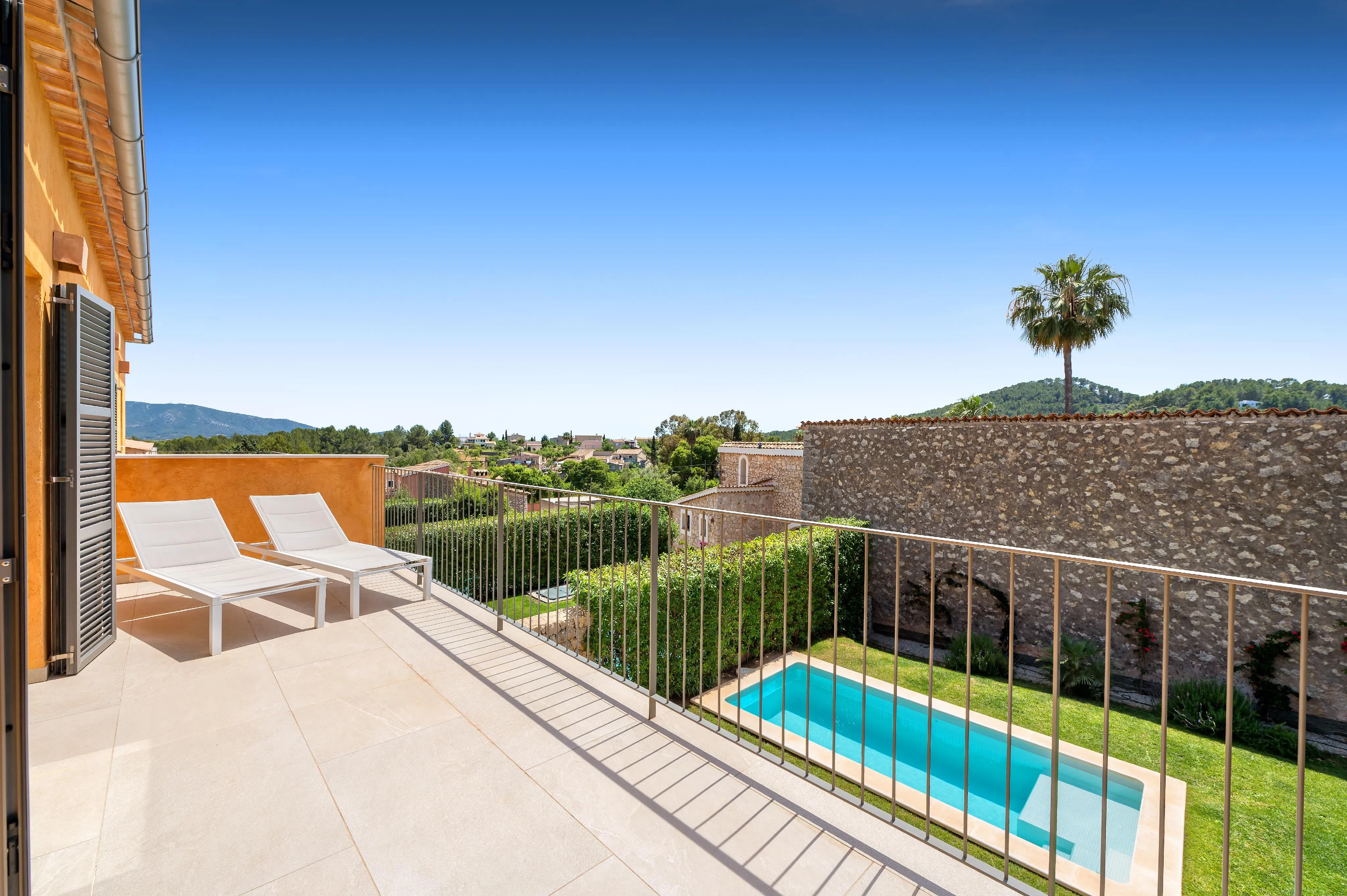 Modern end-of-terrace house with pool and garden in Es Capdellà-13