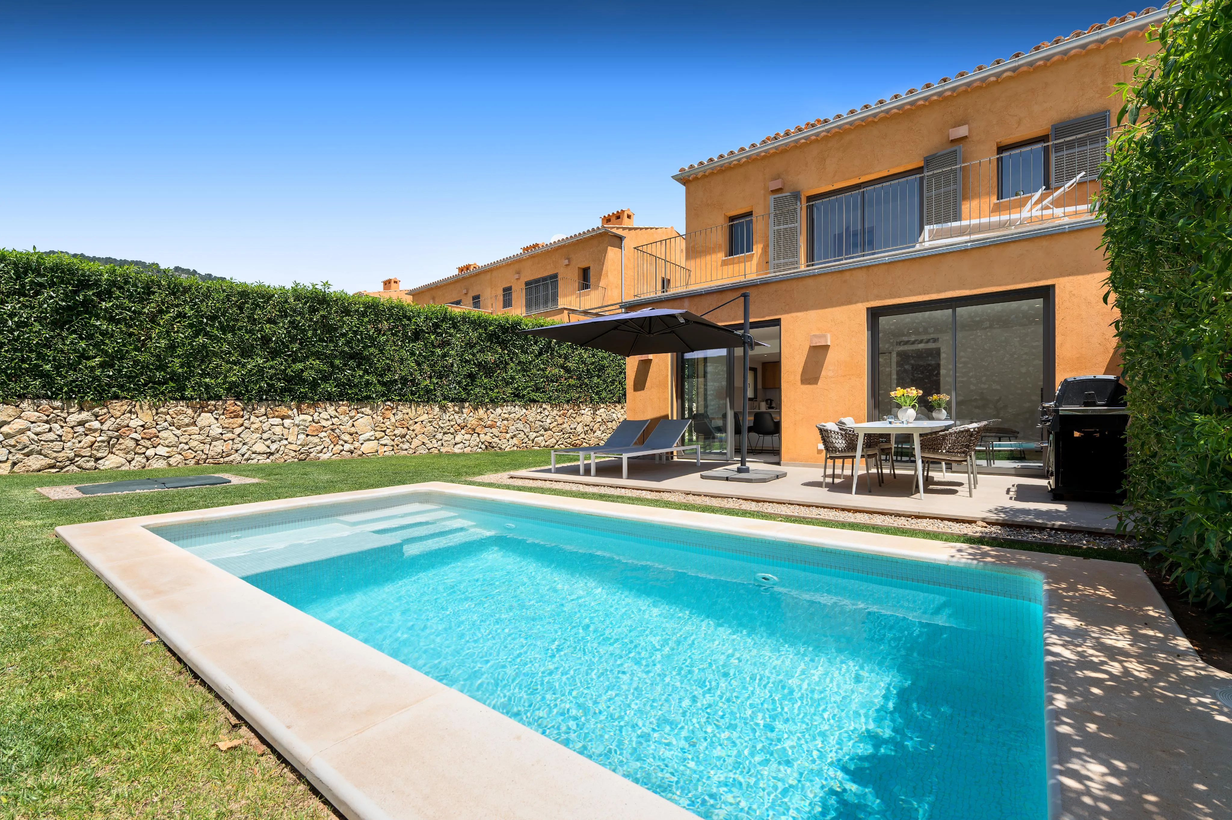 Modern end-of-terrace house with pool and garden in Es Capdellà-17
