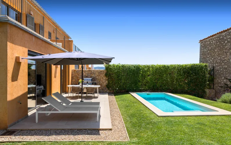 Modern end-of-terrace house with pool and garden in Es Capdellà
