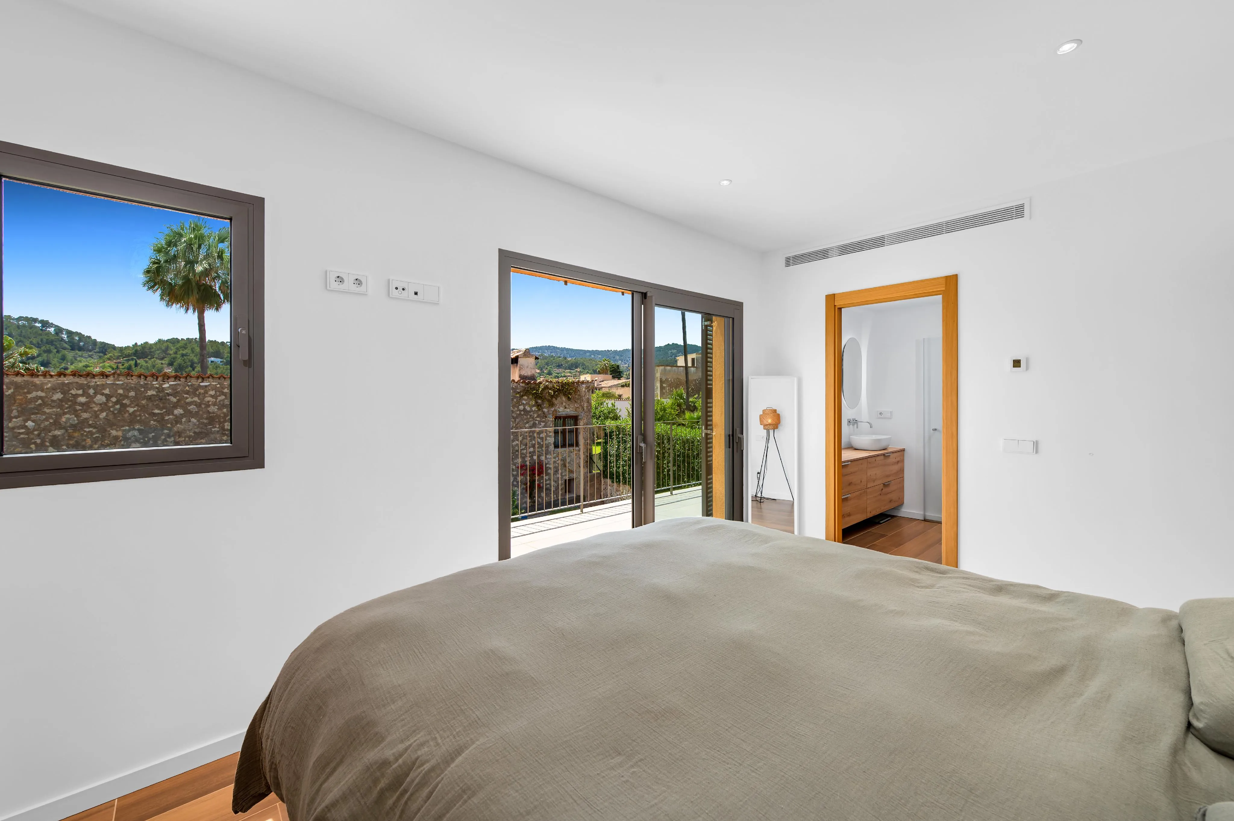 Modern end-of-terrace house with pool and garden in Es Capdellà-11