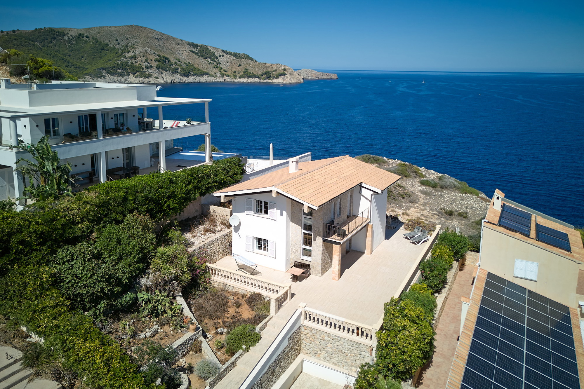 Casa amb vistes al mar i postes de sol sobre Cala Agulla