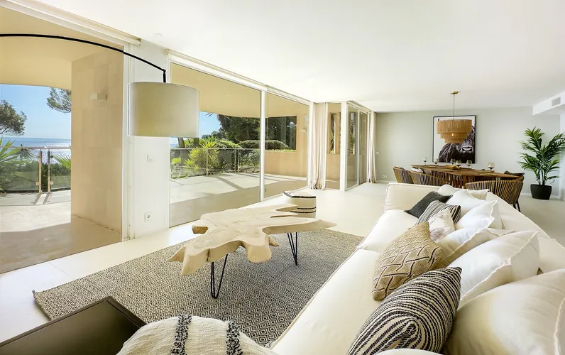 Exclusive frontline apartment in Cala Vinyas with direct sea access