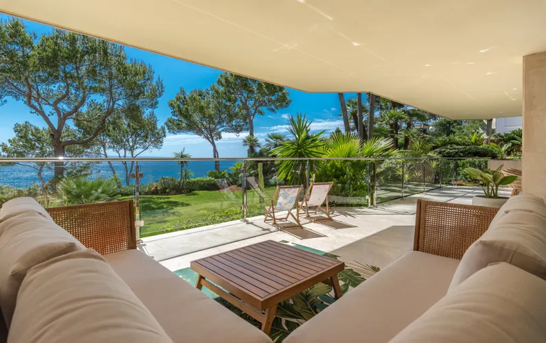 Exclusive frontline apartment in Cala Vinyas with direct sea access