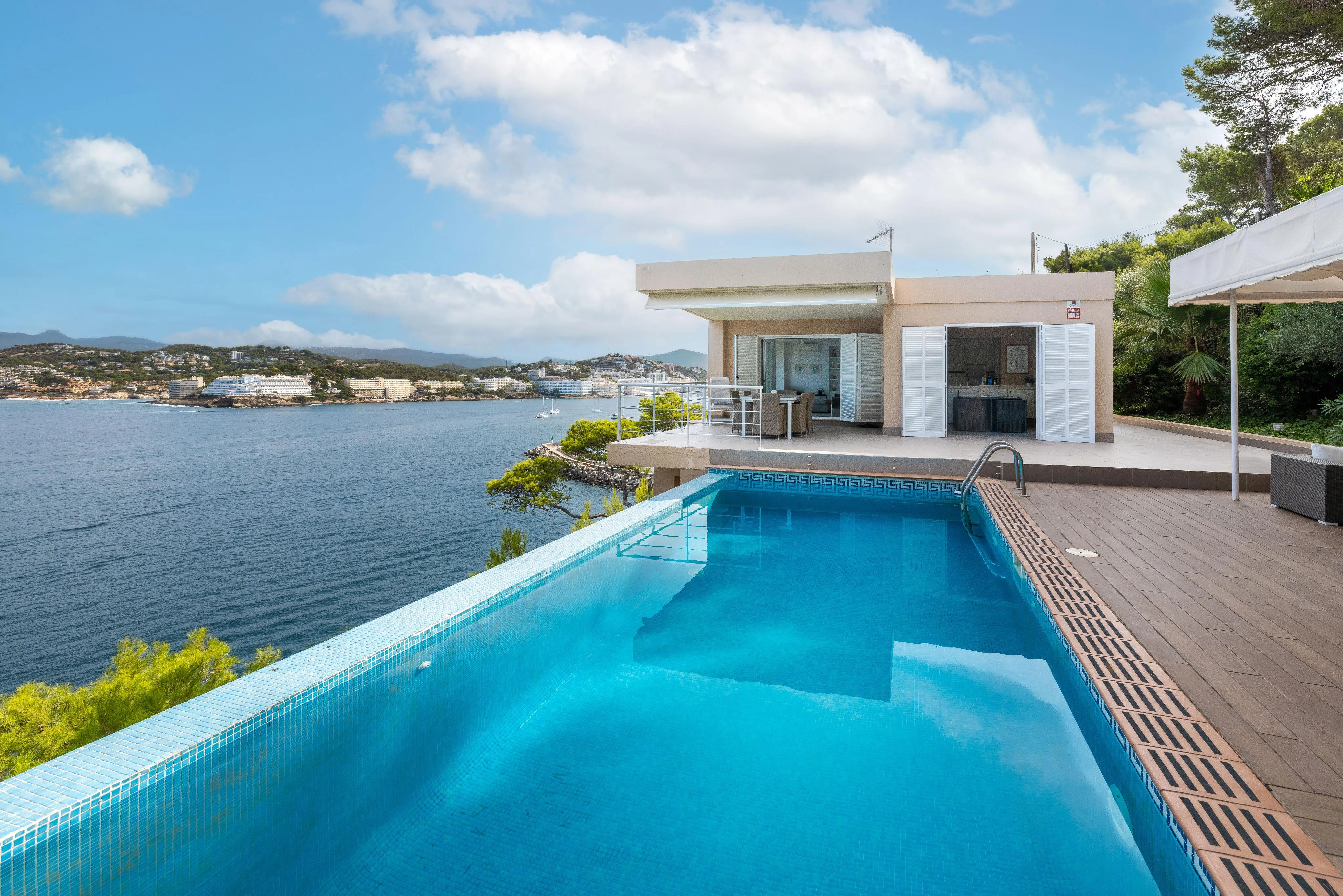 Villa in first sea line with impressive views-1